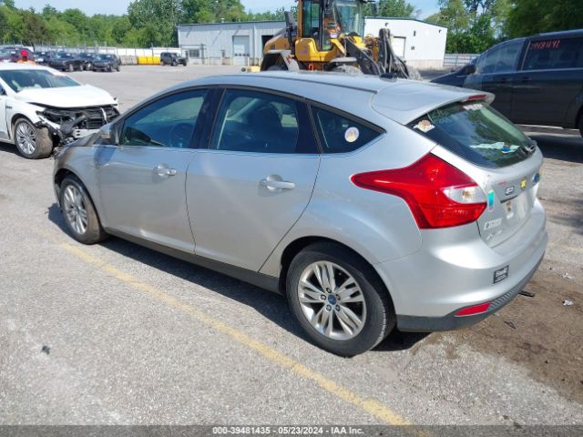 Photo 2 VIN: 1FAHP3M23CL234458 - FORD FOCUS 