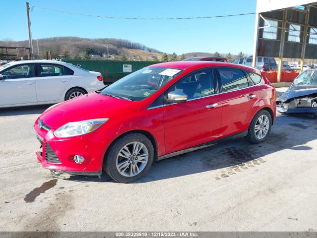 Photo 1 VIN: 1FAHP3M23CL373778 - FORD FOCUS 