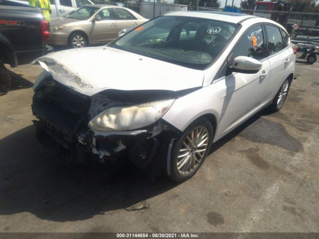 Photo 1 VIN: 1FAHP3M23CL374025 - FORD FOCUS 