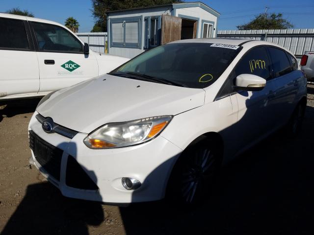 Photo 1 VIN: 1FAHP3M23CL374302 - FORD FOCUS SEL 