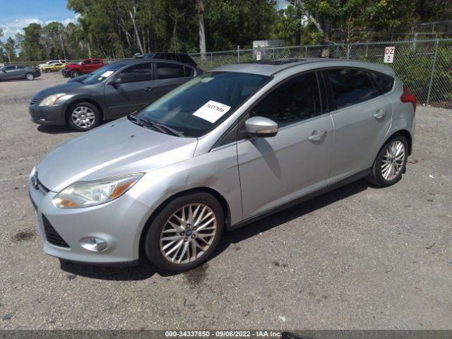 Photo 1 VIN: 1FAHP3M23CL384974 - FORD FOCUS 