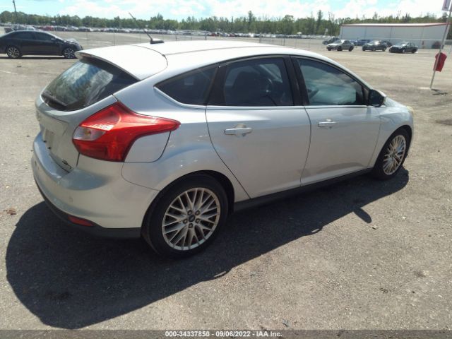 Photo 3 VIN: 1FAHP3M23CL384974 - FORD FOCUS 