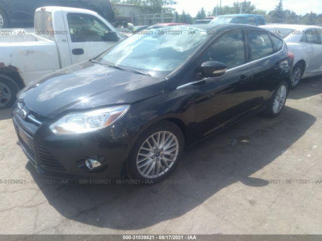 Photo 1 VIN: 1FAHP3M23CL414698 - FORD FOCUS 