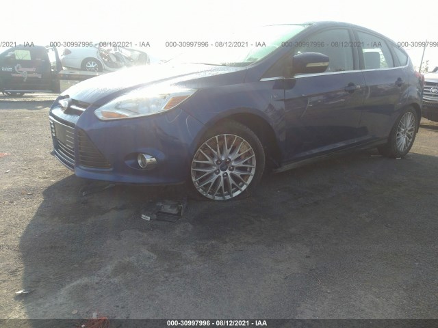 Photo 5 VIN: 1FAHP3M23CL454392 - FORD FOCUS 