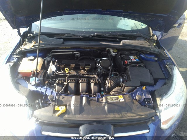 Photo 9 VIN: 1FAHP3M23CL454392 - FORD FOCUS 