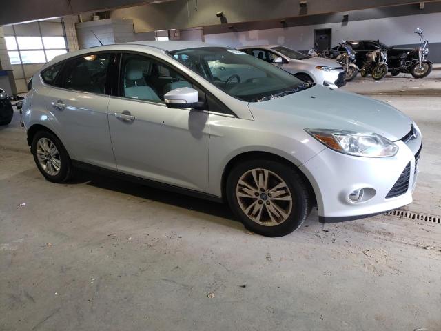 Photo 3 VIN: 1FAHP3M24CL124843 - FORD FOCUS 