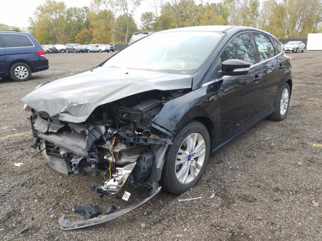 Photo 1 VIN: 1FAHP3M24CL209746 - FORD FOCUS SEL 