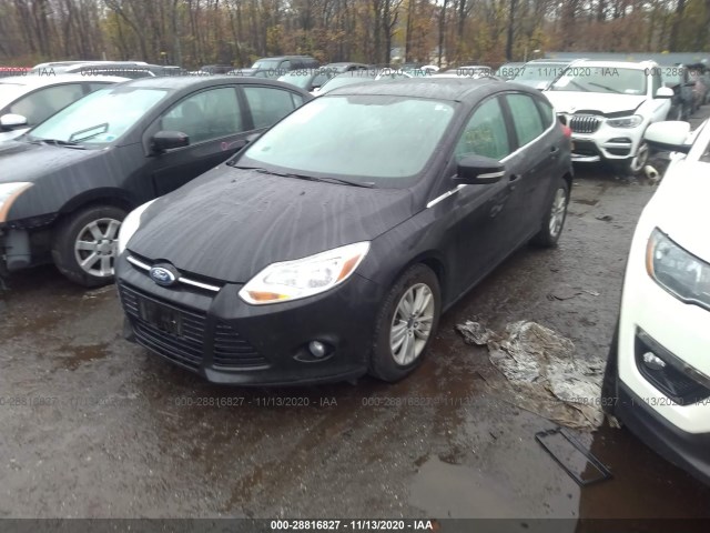 Photo 1 VIN: 1FAHP3M24CL290778 - FORD FOCUS 