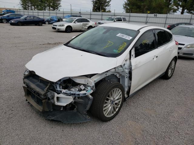 Photo 1 VIN: 1FAHP3M24CL302198 - FORD FOCUS SEL 