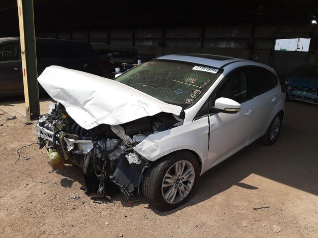 Photo 1 VIN: 1FAHP3M24CL324833 - FORD FOCUS SEL 