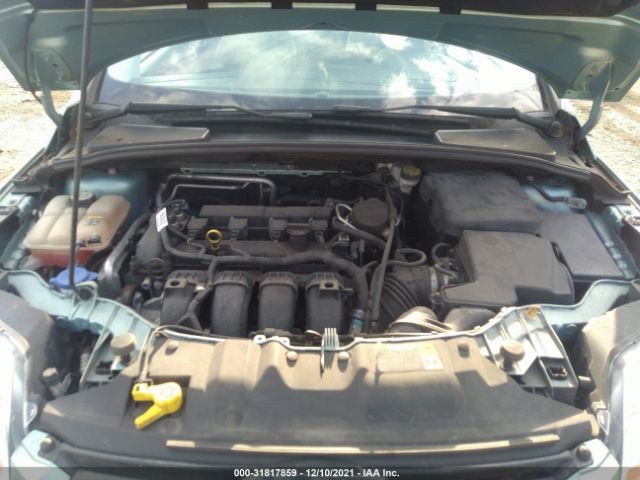 Photo 9 VIN: 1FAHP3M24CL339154 - FORD FOCUS 