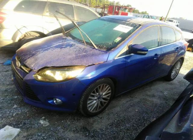 Photo 1 VIN: 1FAHP3M24CL378701 - FORD FOCUS 