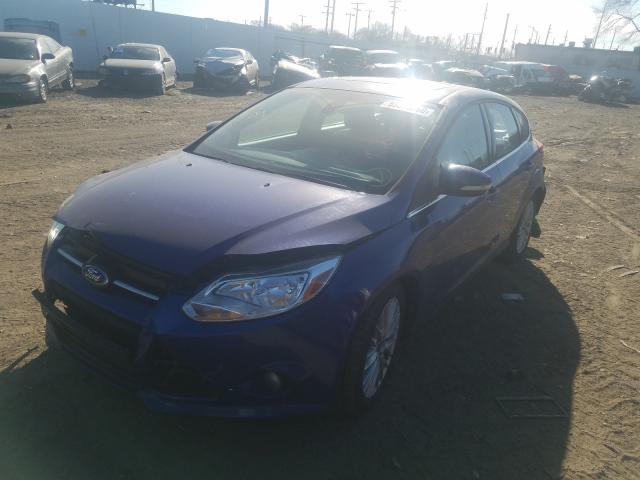 Photo 1 VIN: 1FAHP3M24CL454076 - FORD FOCUS SEL 