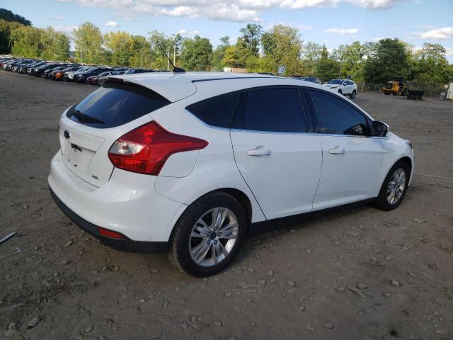 Photo 2 VIN: 1FAHP3M24CL469242 - FORD FOCUS 