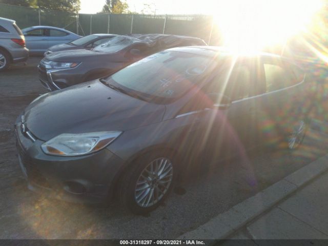 Photo 1 VIN: 1FAHP3M25CL137973 - FORD FOCUS 