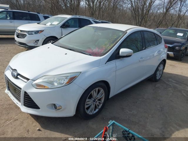 Photo 1 VIN: 1FAHP3M25CL270958 - FORD FOCUS 