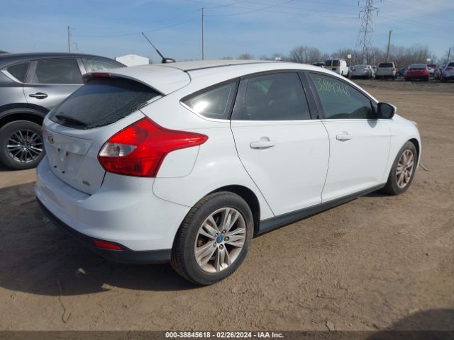 Photo 3 VIN: 1FAHP3M25CL270958 - FORD FOCUS 