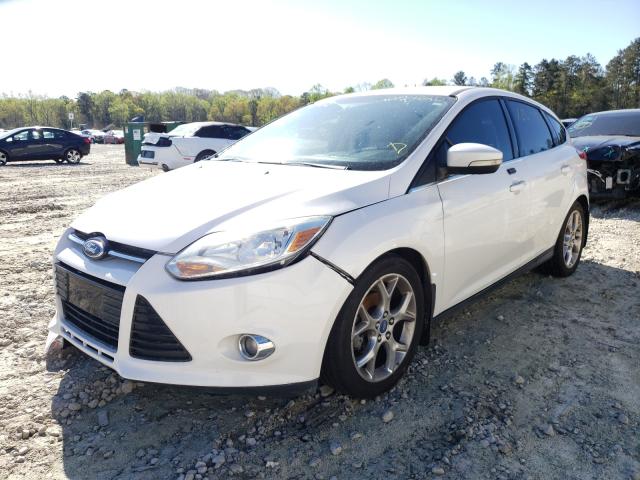 Photo 1 VIN: 1FAHP3M25CL287422 - FORD FOCUS 