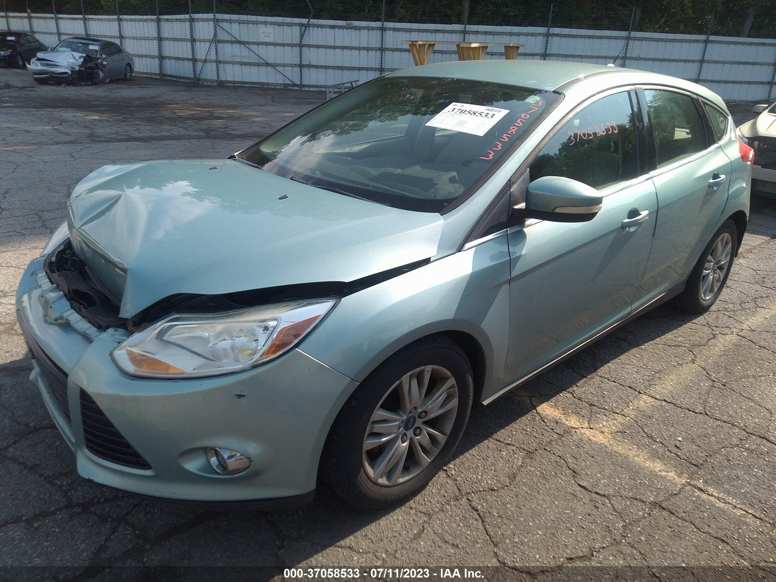 Photo 1 VIN: 1FAHP3M25CL363589 - FORD FOCUS 