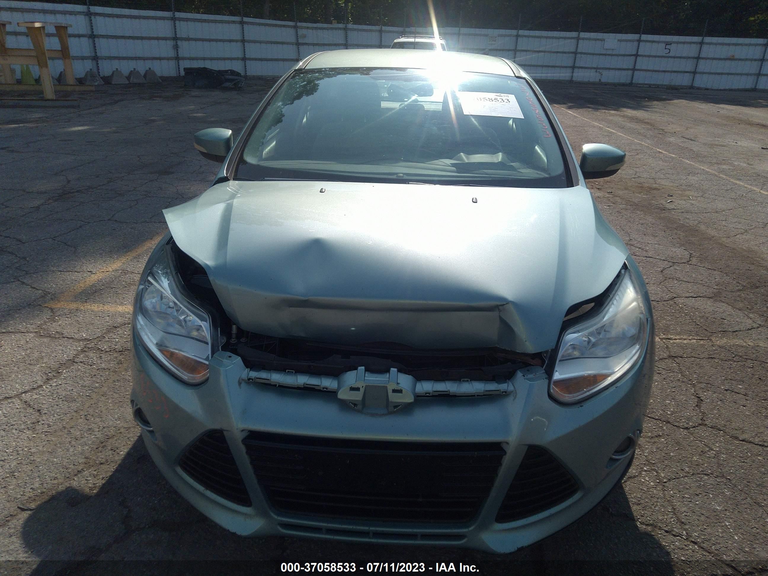 Photo 11 VIN: 1FAHP3M25CL363589 - FORD FOCUS 