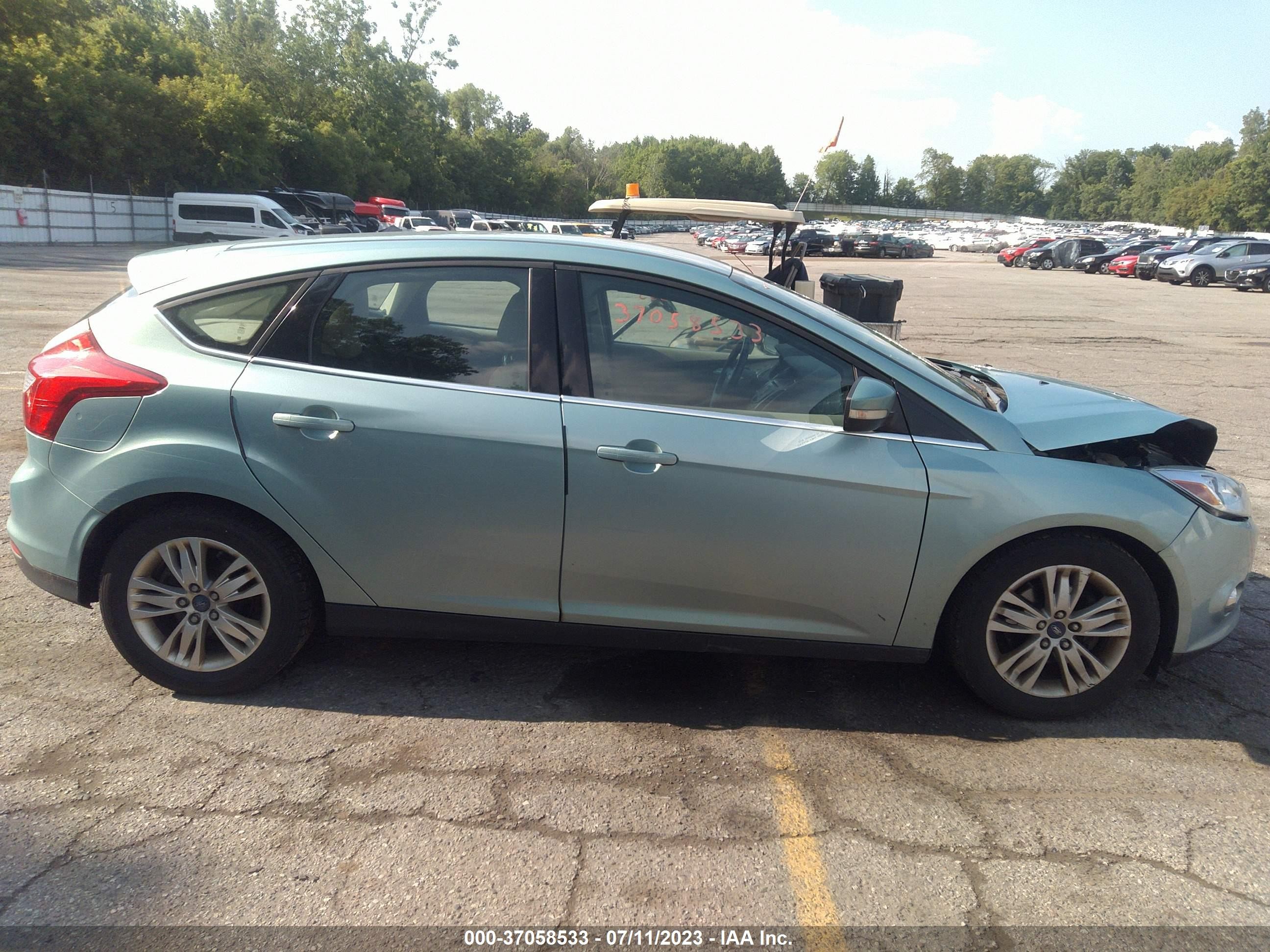 Photo 12 VIN: 1FAHP3M25CL363589 - FORD FOCUS 