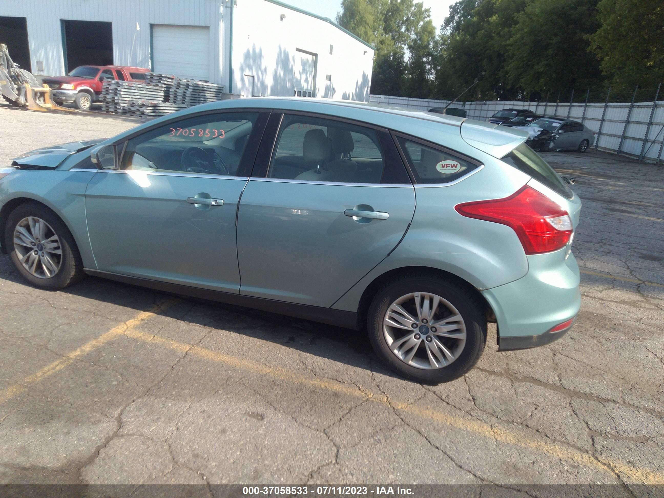 Photo 13 VIN: 1FAHP3M25CL363589 - FORD FOCUS 