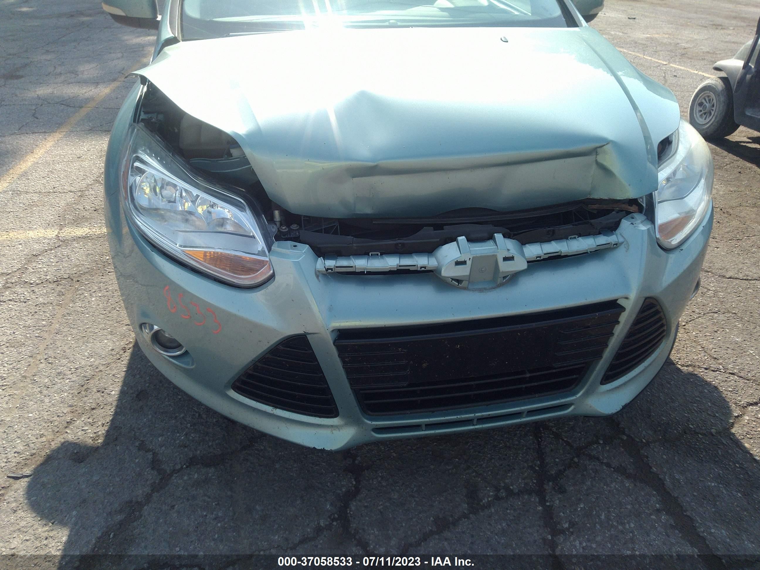 Photo 5 VIN: 1FAHP3M25CL363589 - FORD FOCUS 