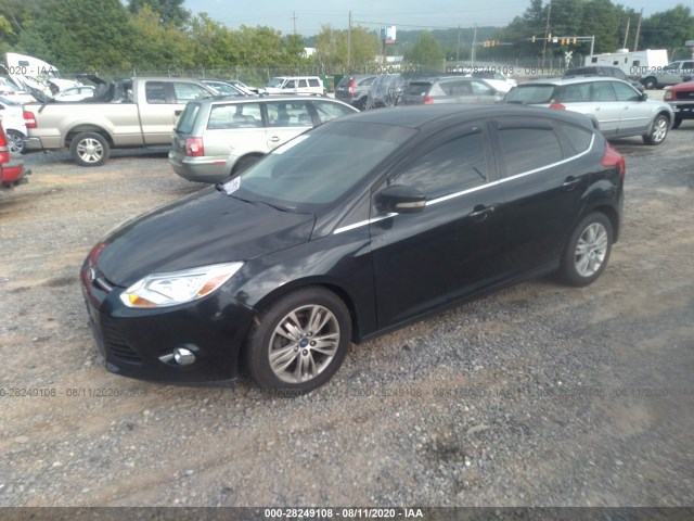 Photo 1 VIN: 1FAHP3M26CL157293 - FORD FOCUS 