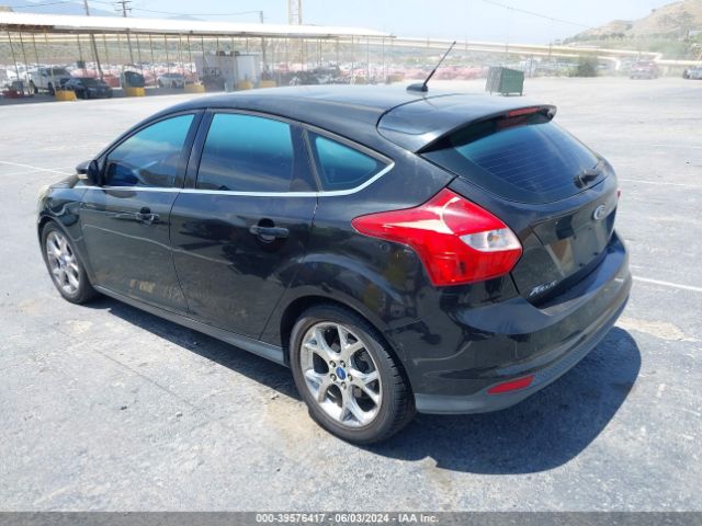 Photo 2 VIN: 1FAHP3M26CL175048 - FORD FOCUS 