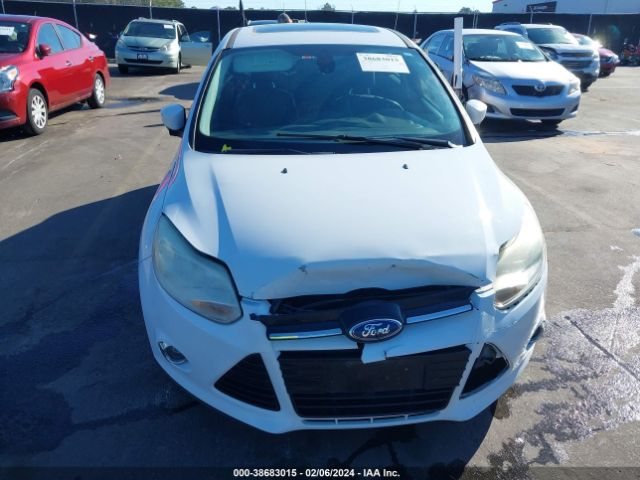 Photo 5 VIN: 1FAHP3M26CL177060 - FORD FOCUS 