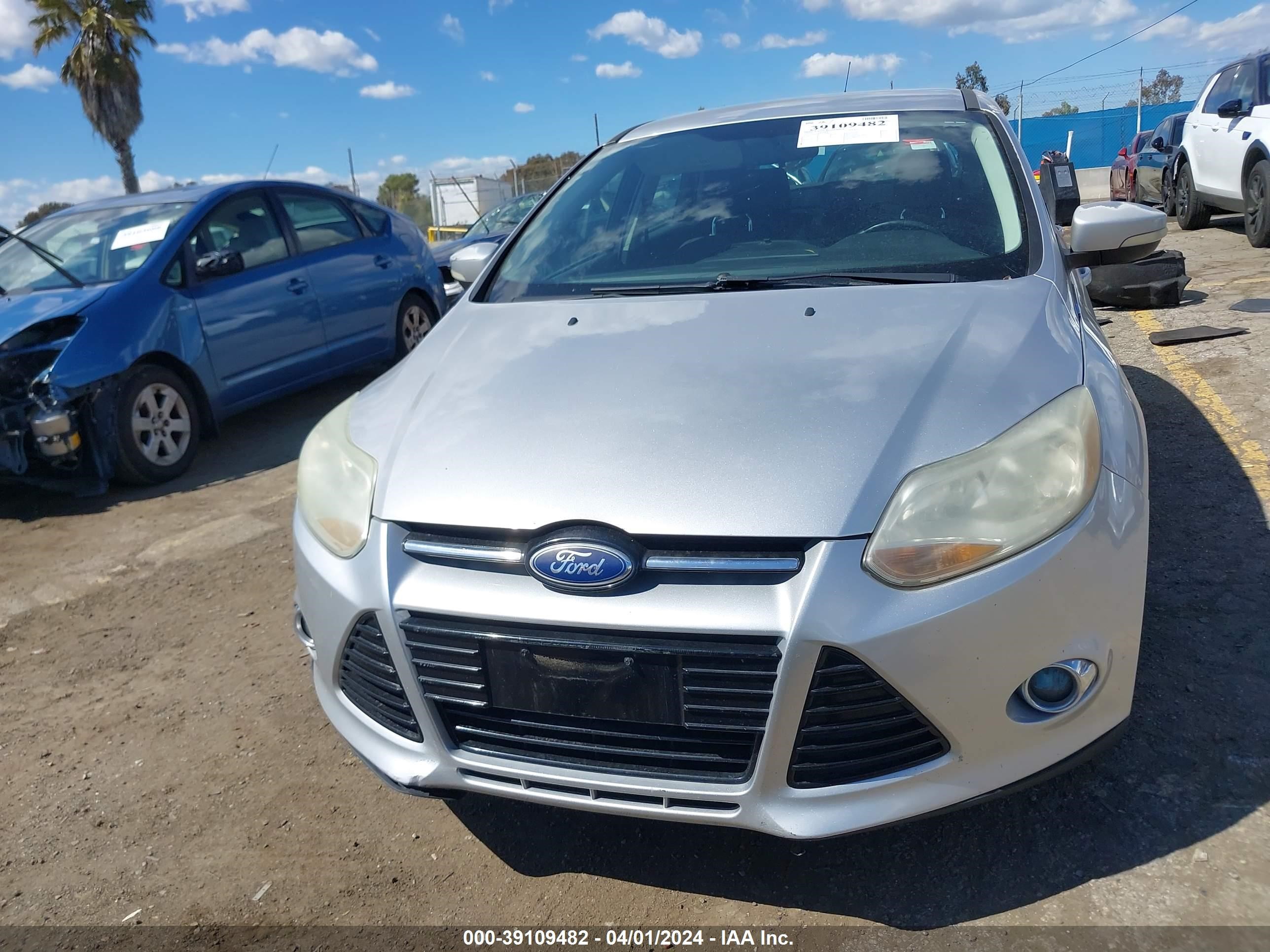 Photo 11 VIN: 1FAHP3M26CL200403 - FORD FOCUS 