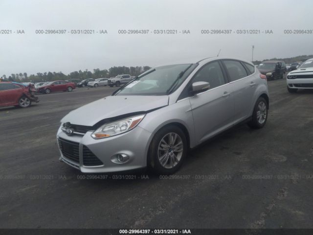 Photo 1 VIN: 1FAHP3M26CL371863 - FORD FOCUS 