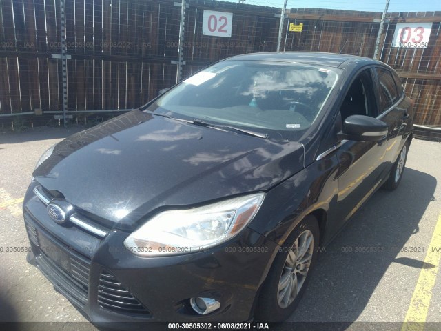 Photo 1 VIN: 1FAHP3M26CL386783 - FORD FOCUS 