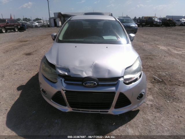 Photo 5 VIN: 1FAHP3M27CL142110 - FORD FOCUS 