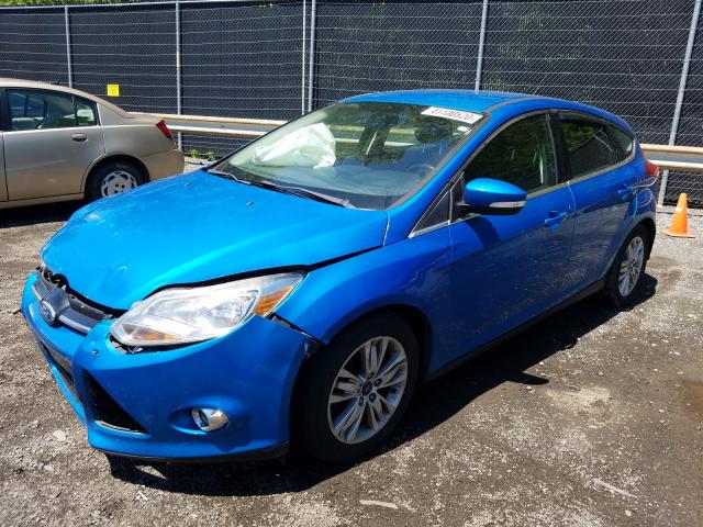 Photo 1 VIN: 1FAHP3M27CL161840 - FORD FOCUS SEL 