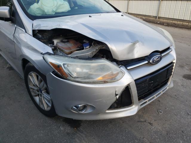 Photo 8 VIN: 1FAHP3M27CL348768 - FORD FOCUS SEL 