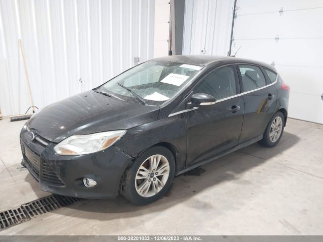 Photo 1 VIN: 1FAHP3M27CL477058 - FORD FOCUS 