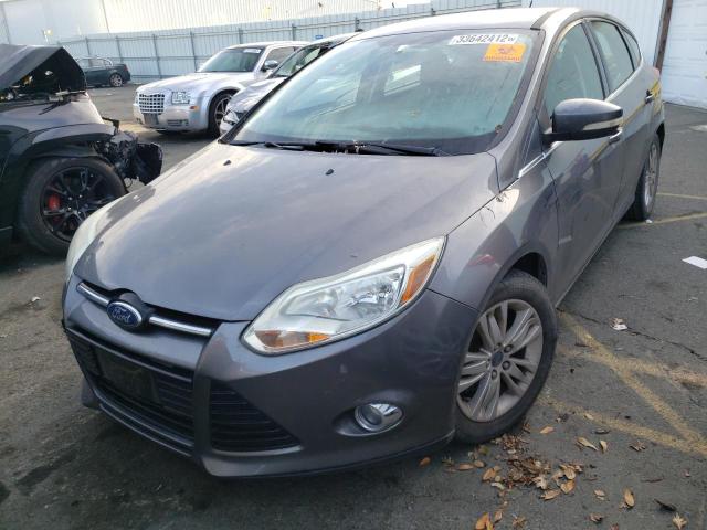 Photo 1 VIN: 1FAHP3M28CL190103 - FORD FOCUS SEL 