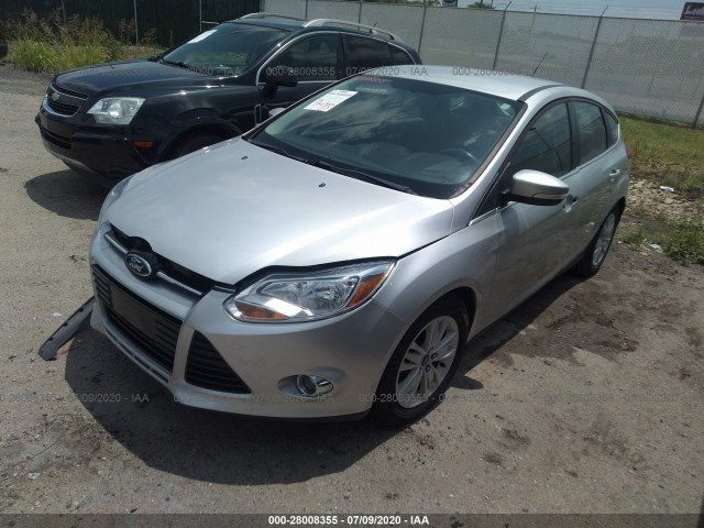 Photo 1 VIN: 1FAHP3M28CL349735 - FORD FOCUS 