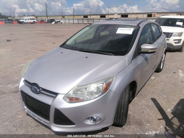 Photo 1 VIN: 1FAHP3M28CL357995 - FORD FOCUS 