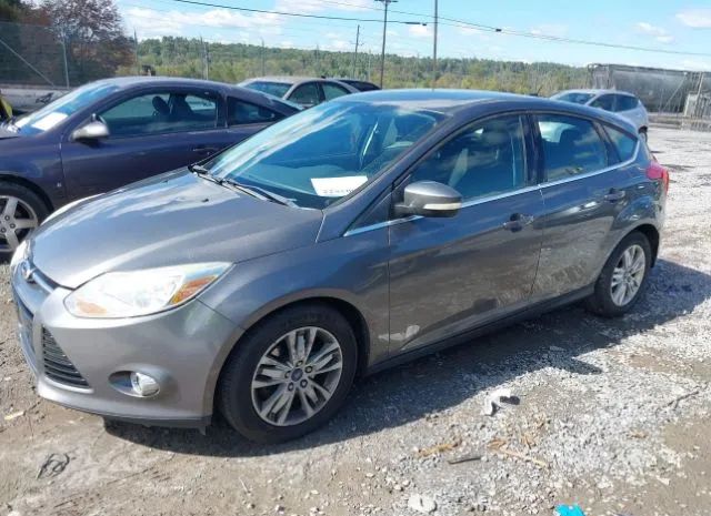 Photo 1 VIN: 1FAHP3M28CL358757 - FORD FOCUS 