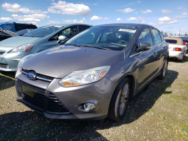 Photo 1 VIN: 1FAHP3M28CL410811 - FORD FOCUS SEL 