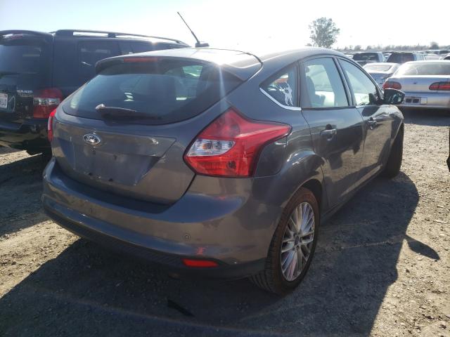 Photo 3 VIN: 1FAHP3M28CL410811 - FORD FOCUS SEL 