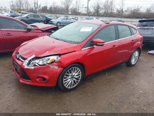 Photo 1 VIN: 1FAHP3M28CL448703 - FORD FOCUS 