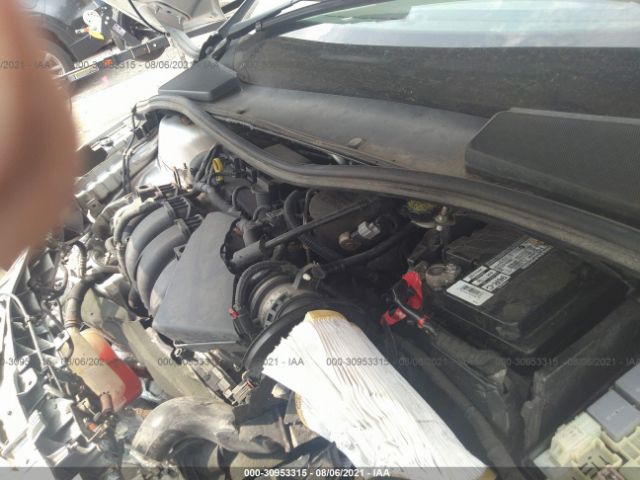 Photo 9 VIN: 1FAHP3M29CL180101 - FORD FOCUS 