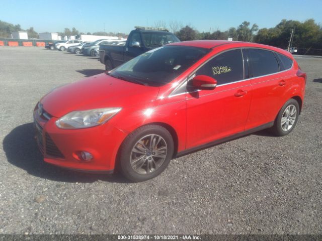 Photo 1 VIN: 1FAHP3M29CL386941 - FORD FOCUS 