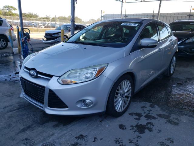 Photo 1 VIN: 1FAHP3M29CL430243 - FORD FOCUS SEL 