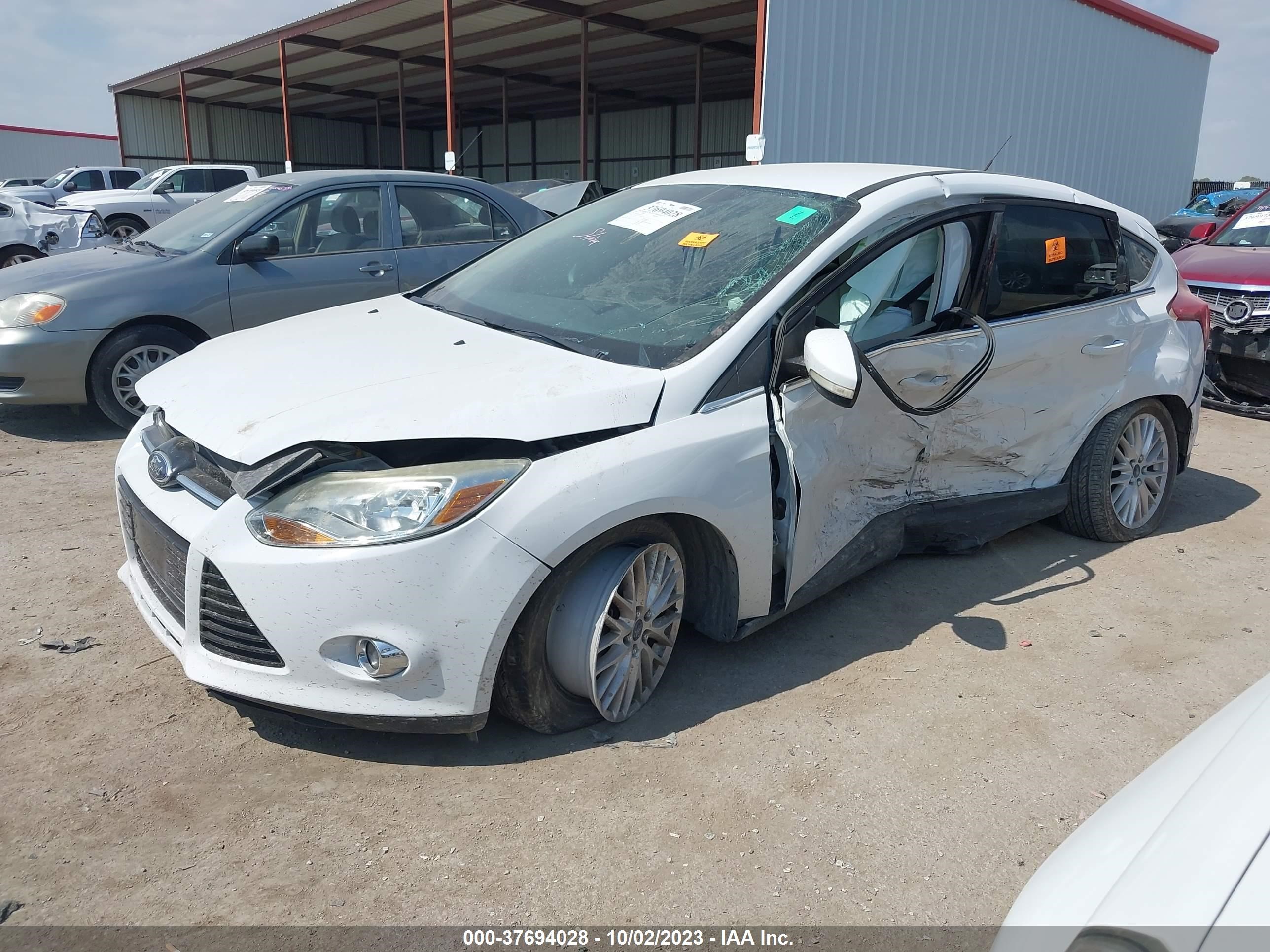 Photo 1 VIN: 1FAHP3M29CL466191 - FORD FOCUS 