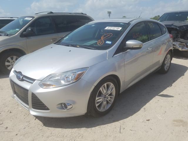 Photo 1 VIN: 1FAHP3M2XCL141114 - FORD FOCUS SEL 