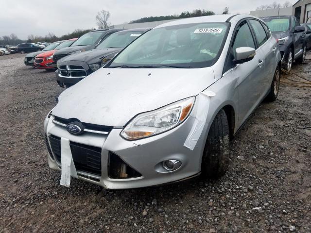 Photo 1 VIN: 1FAHP3M2XCL207029 - FORD FOCUS SEL 